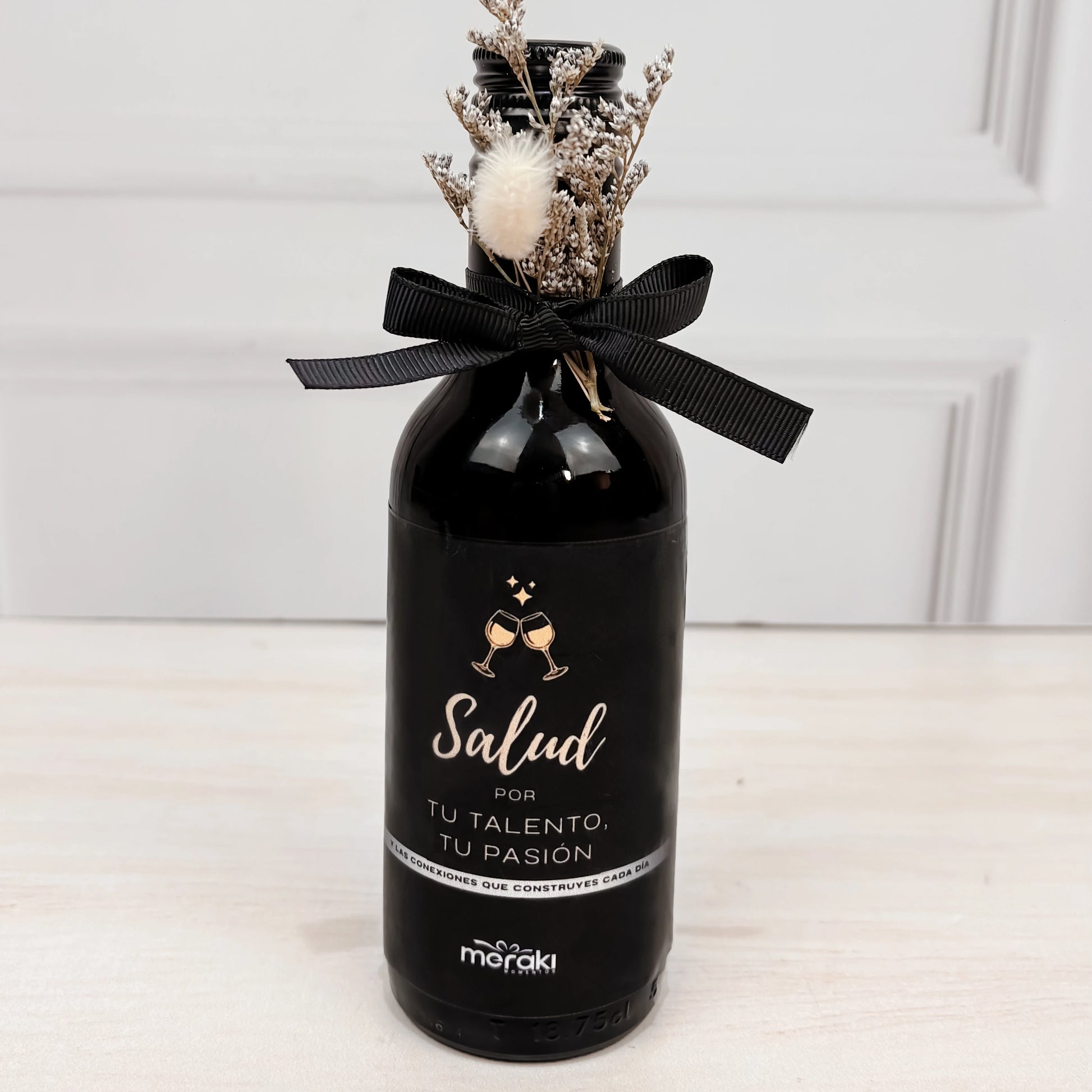 Botella decorativa con flores